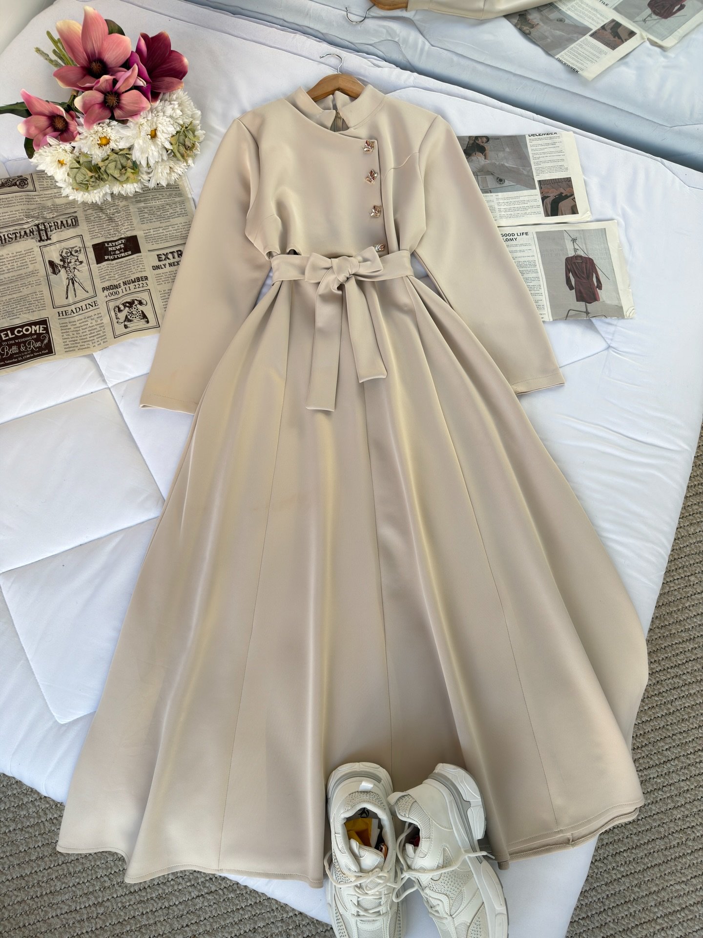 “Golden Elegance: Long-Sleeved Maxi Dress with Statement Details”