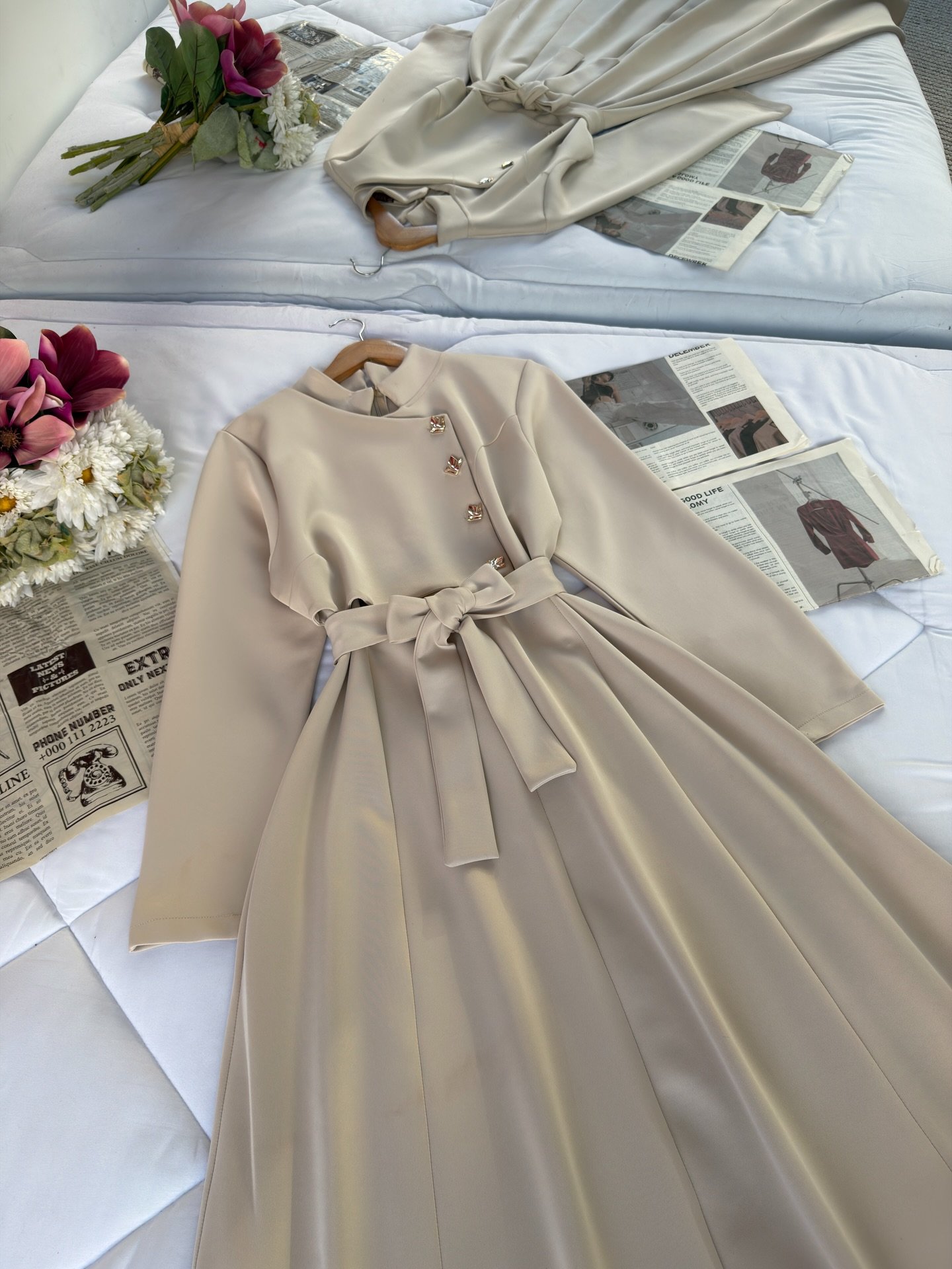 “Golden Elegance: Long-Sleeved Maxi Dress with Statement Details”