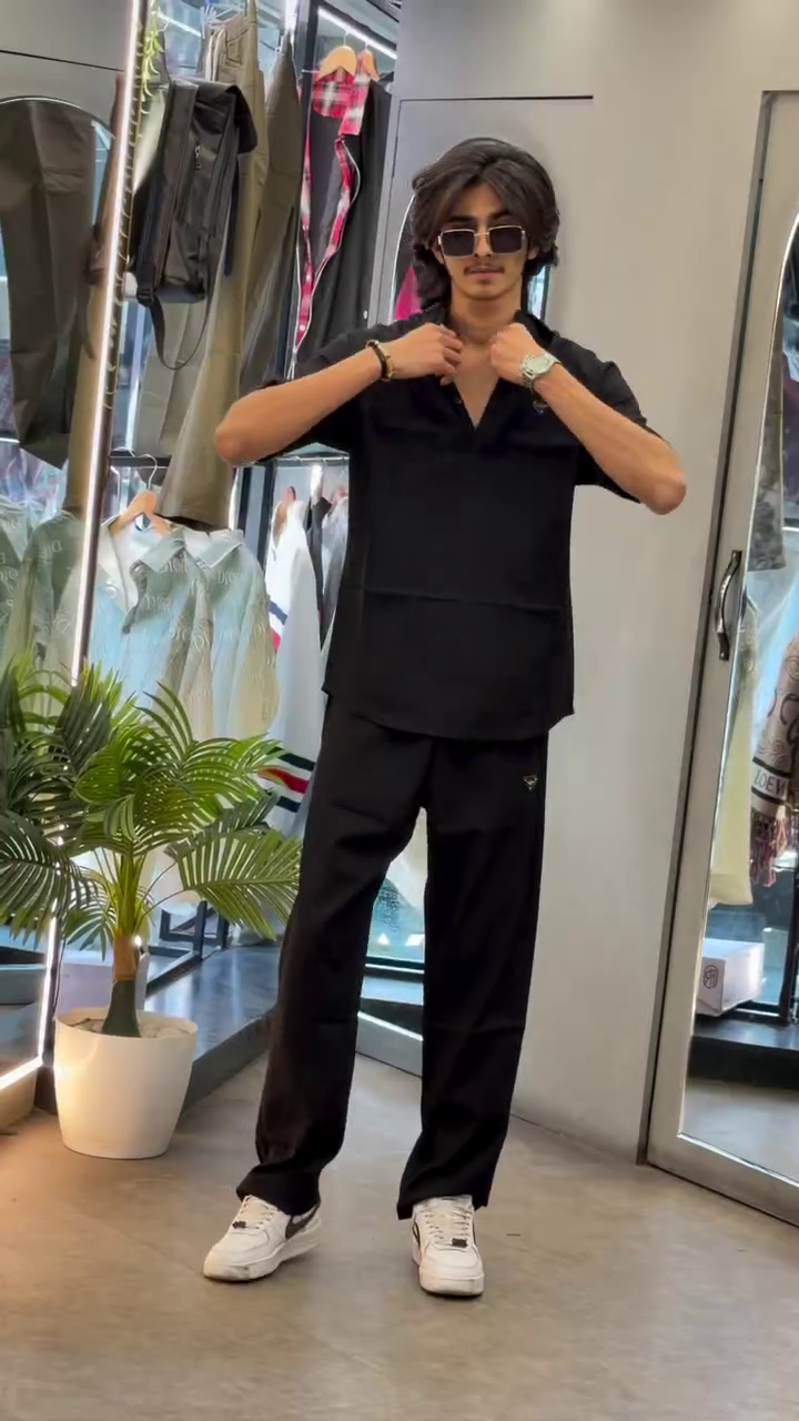 “Casual Sophistication: Grey Cuban Collar Shirt Meets Boot-Cut Trousers”