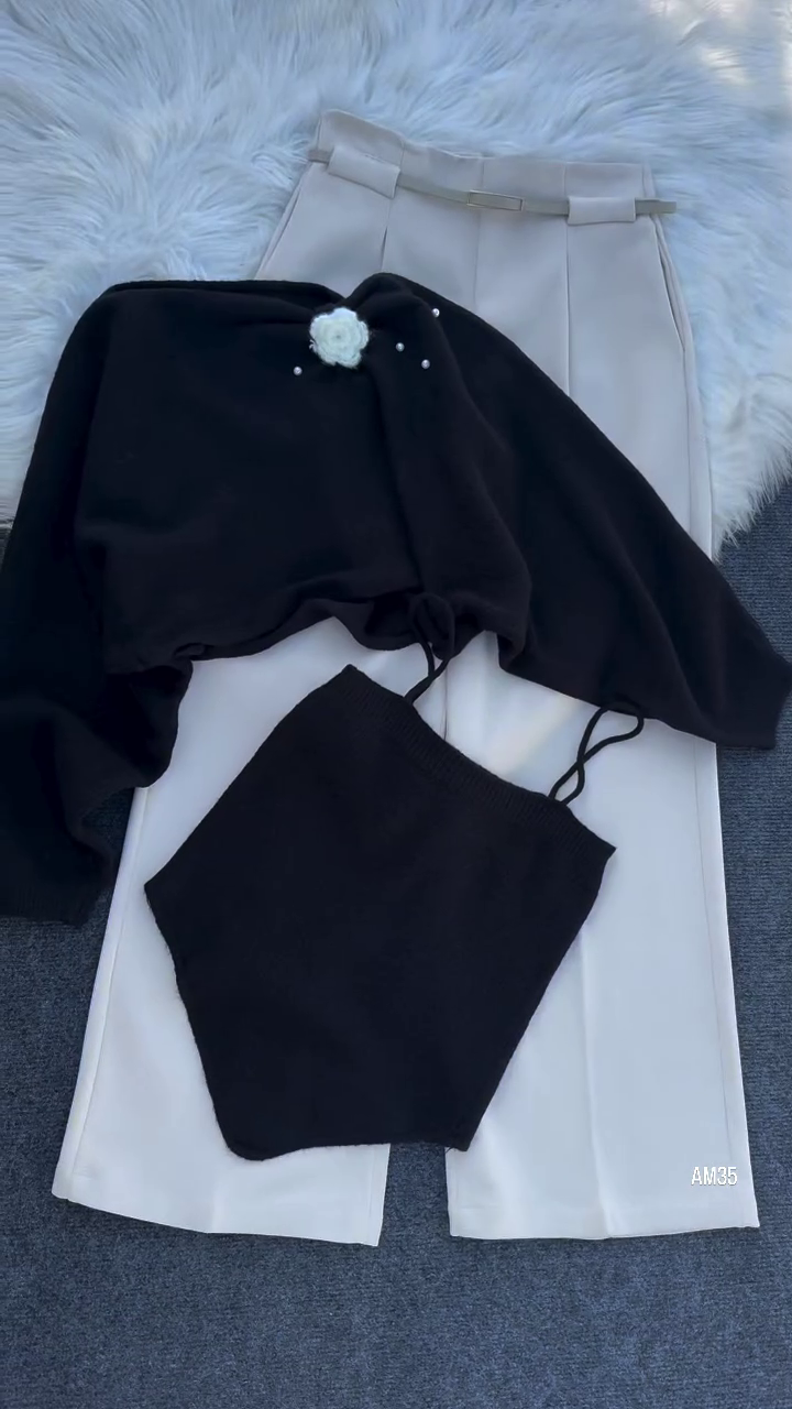 “Chic & Cozy: Knit Top Set with Floral Accent and Cream Trousers”