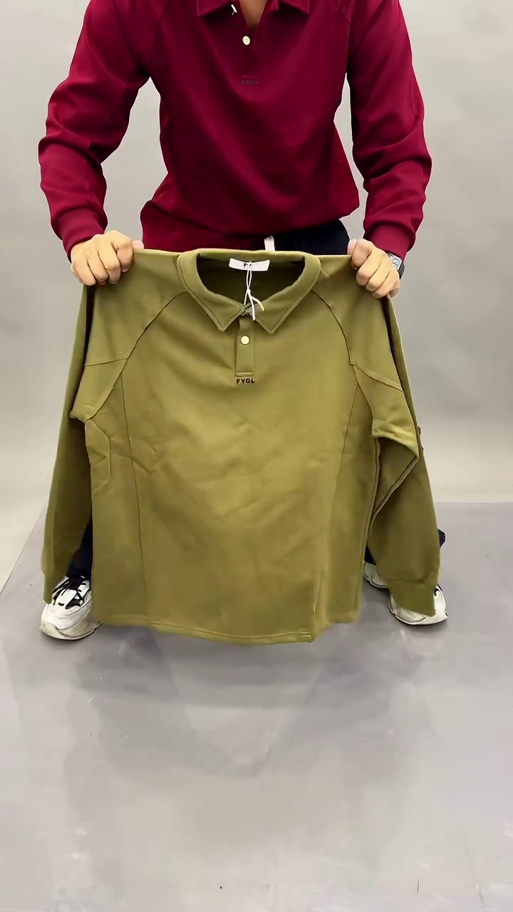 “Timeless Classic: Black Long-Sleeved Polo Shirt for Effortless Style”