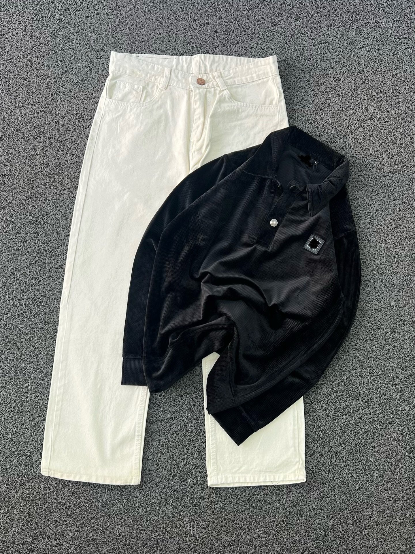 “Casual Edge Meets Classic Style: Red Corduroy Polo with Black Denim Jeans”