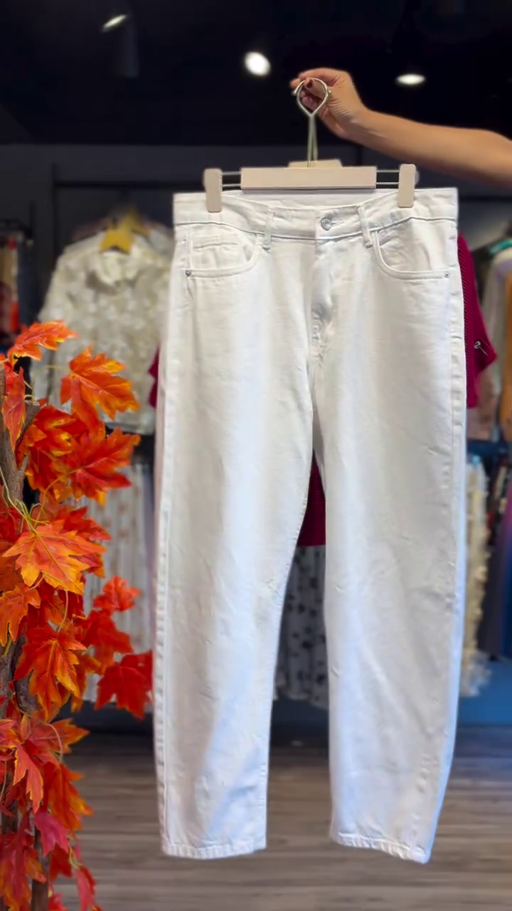 Chic & Cozy – Red Batwing Sweater Top Paired with Crisp White Trousers