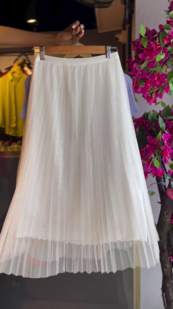 Soft Elegance – Embellished Lavender Ribbed Top Paired with Flowing White Pleated Skirt