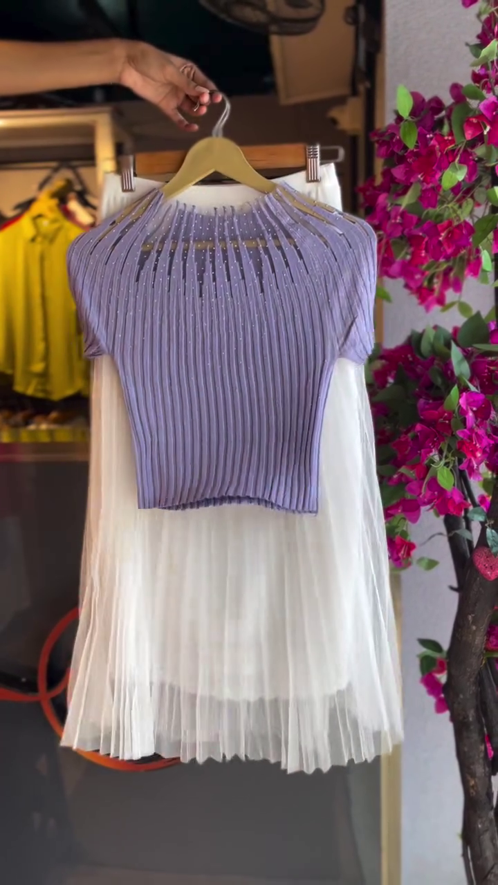 Soft Elegance – Embellished Lavender Ribbed Top Paired with Flowing White Pleated Skirt