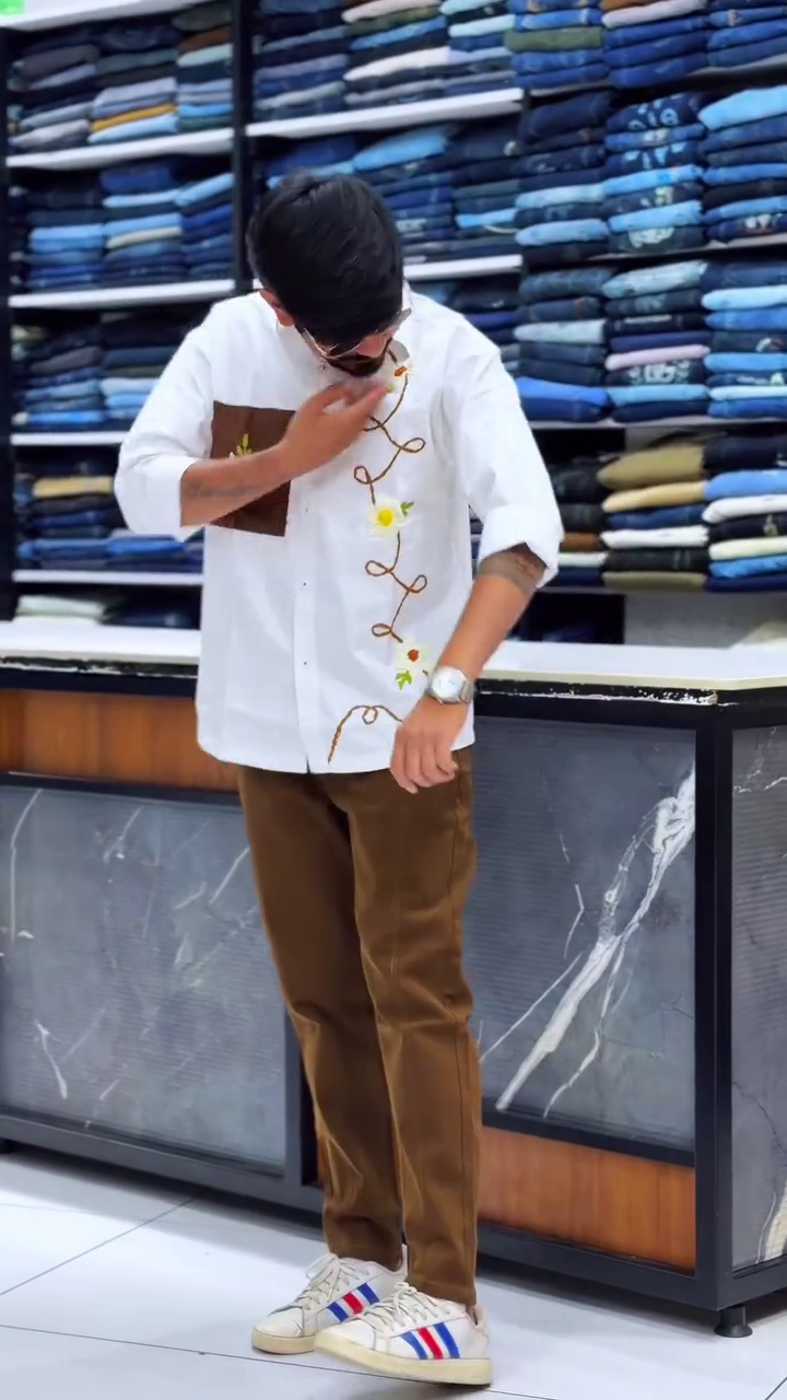 Refined Elegance: White Embroidered Designer Shirt with Brown Trousers