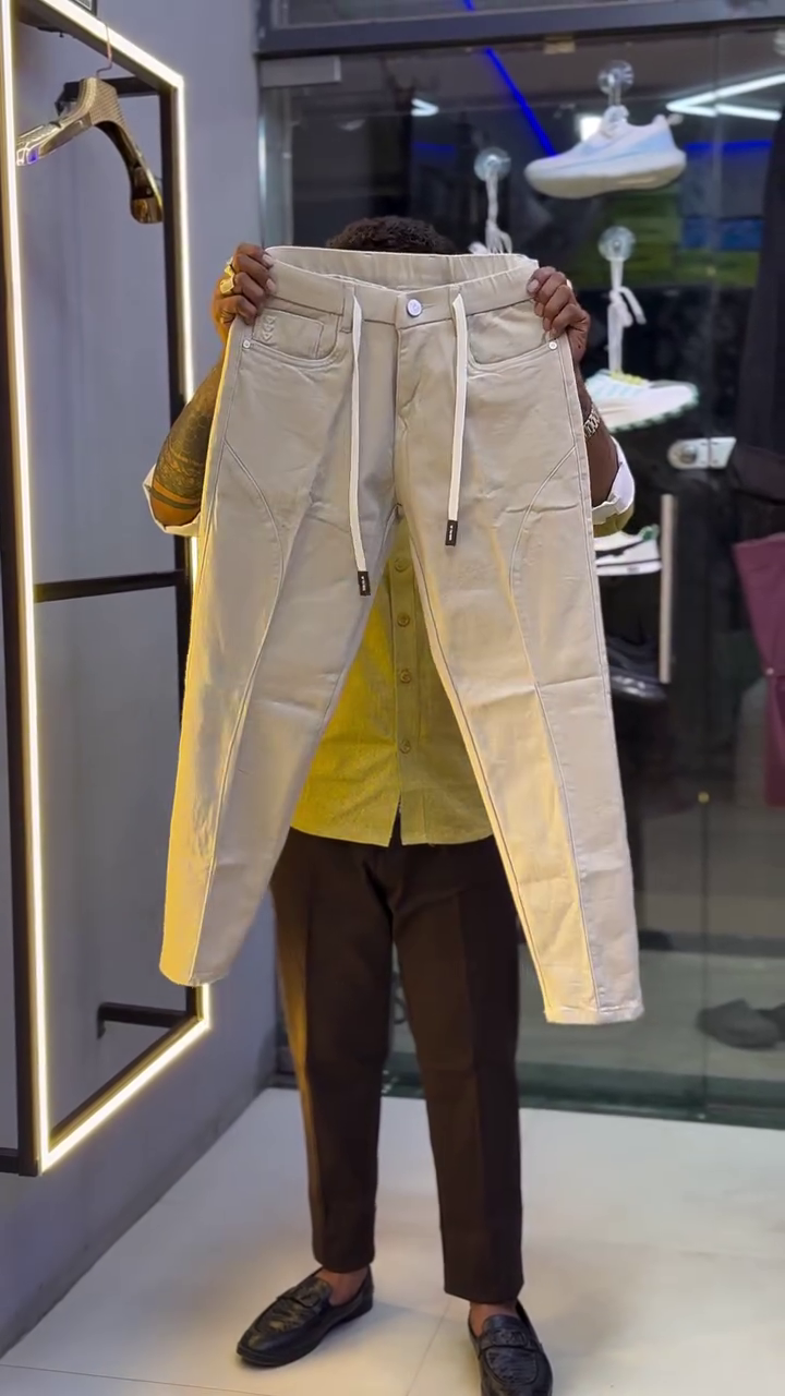 Modern Street Comfort: Men’s Beige Imported Baggy Jeans with Elastic Drawstring Waist & Unique Stitch Detailing