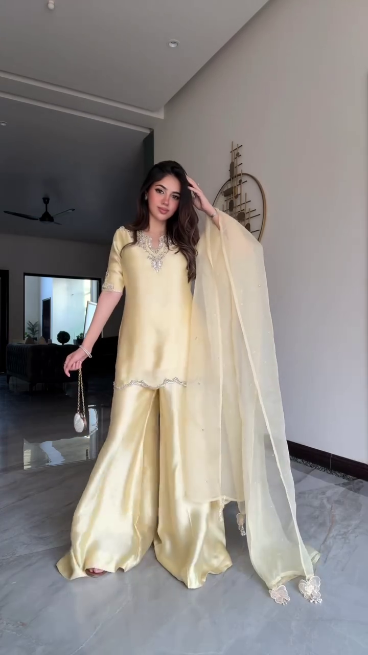Elegant Cream Yellow Satin Designer Suit Set with Embellished Neckline, Wide-Leg Palazzo Pants & Sheer Dupatta for Festive and Party Wear