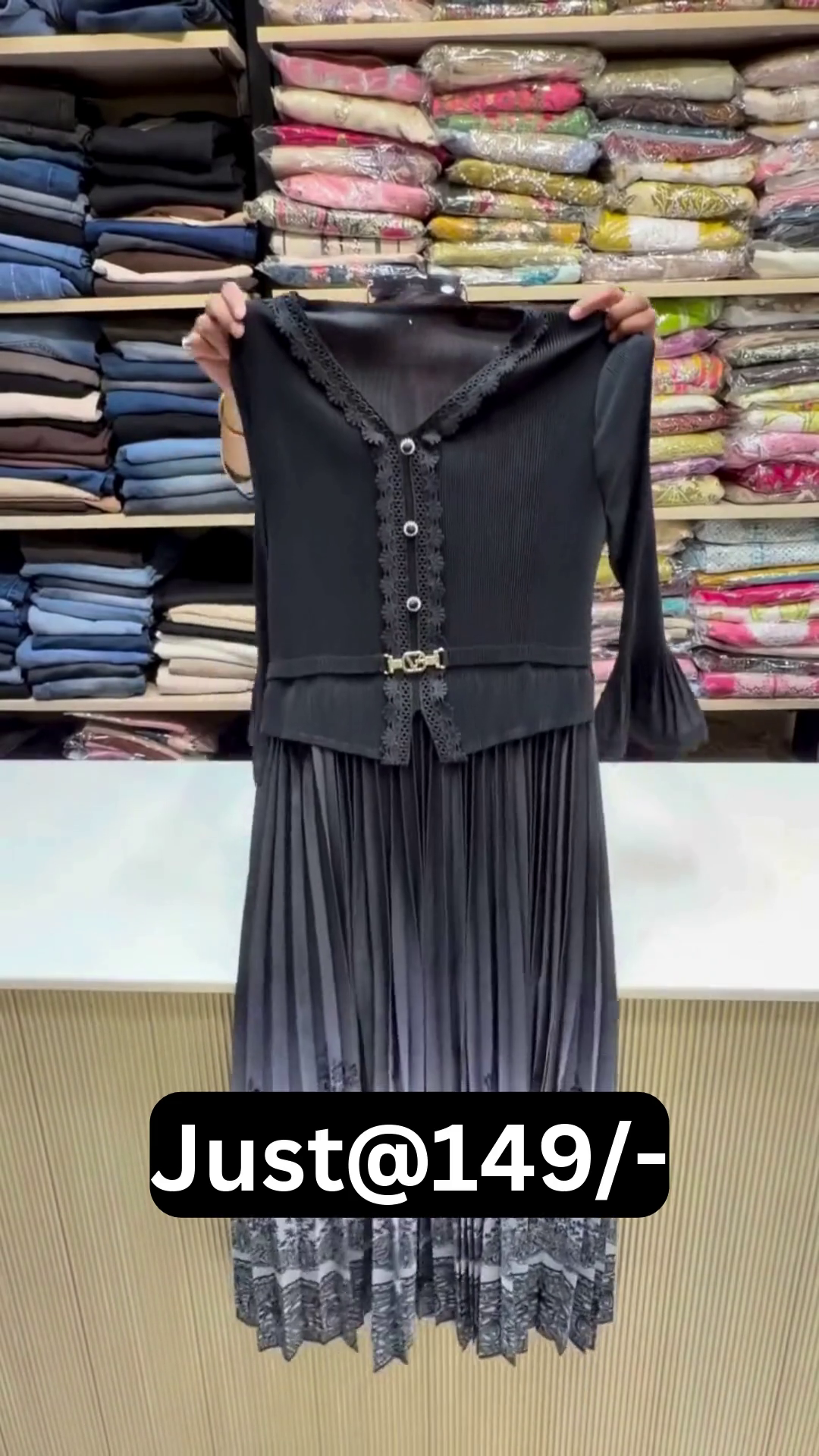 Stylish Black Pleated Kurti Dress with V-Neck Lace Detailing, Button Front, Waist Belt, Flared Sleeves & Floral Embroidered Hem for Elegant Everyday and Casual Wear