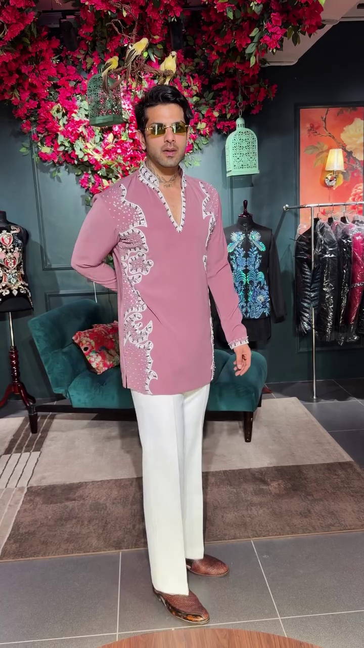 Stylish Dusty Pink Men’s Designer Kurta with Intricate White Embroidery, Elegant V-Neckline, Side Panel Detailing & Full Sleeves for Wedding and Festive Wear