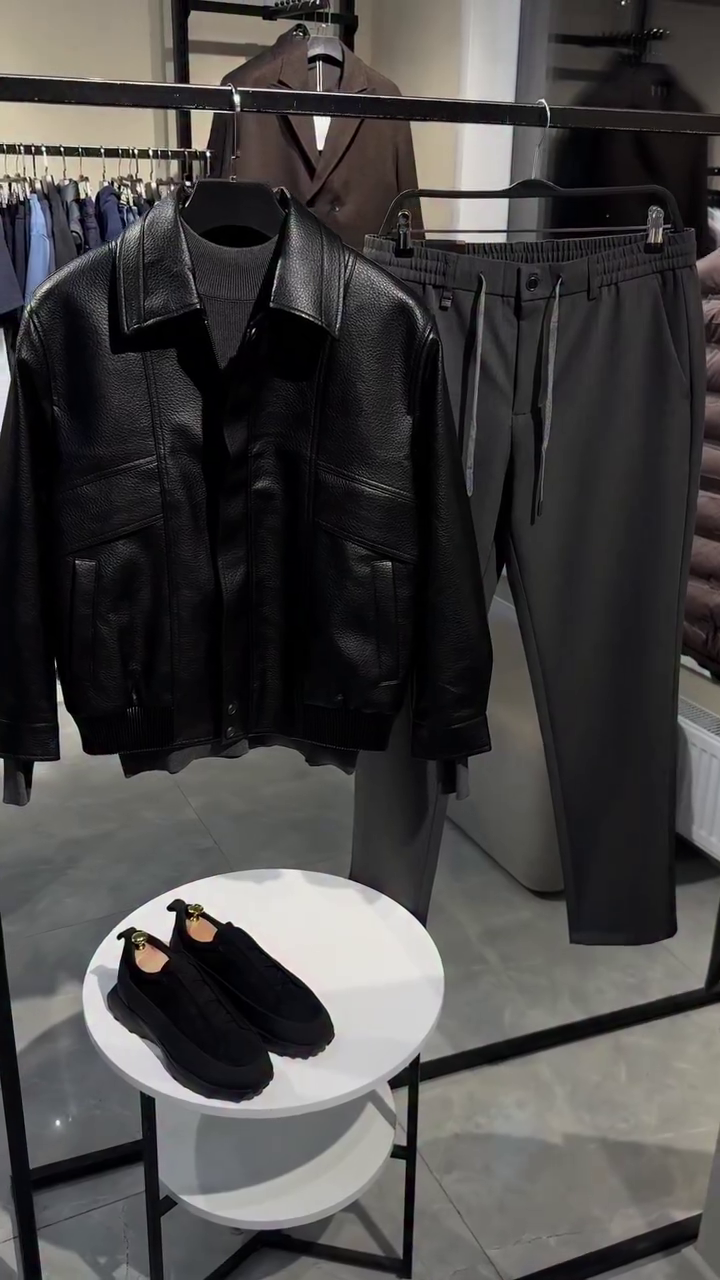 Elevate Your Everyday Wardrobe with This Premium Black Leather Jacket and Relaxed Grey Trousers Streetwear Outfit