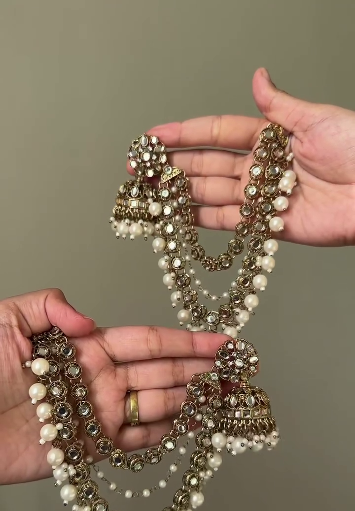 Elegant Antique Gold Necklace Set with Kundan-Style Stones, Layered Chains, Pearl Drops and Matching Statement Jhumka Earrings