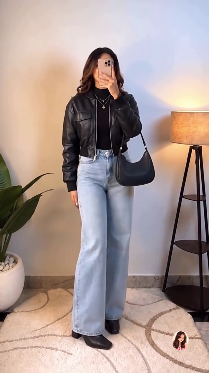 Stylish Black Leather Jacket with Light Blue Wide-Leg Jeans – A Chic, Modern Outfit for Everyday Fashion