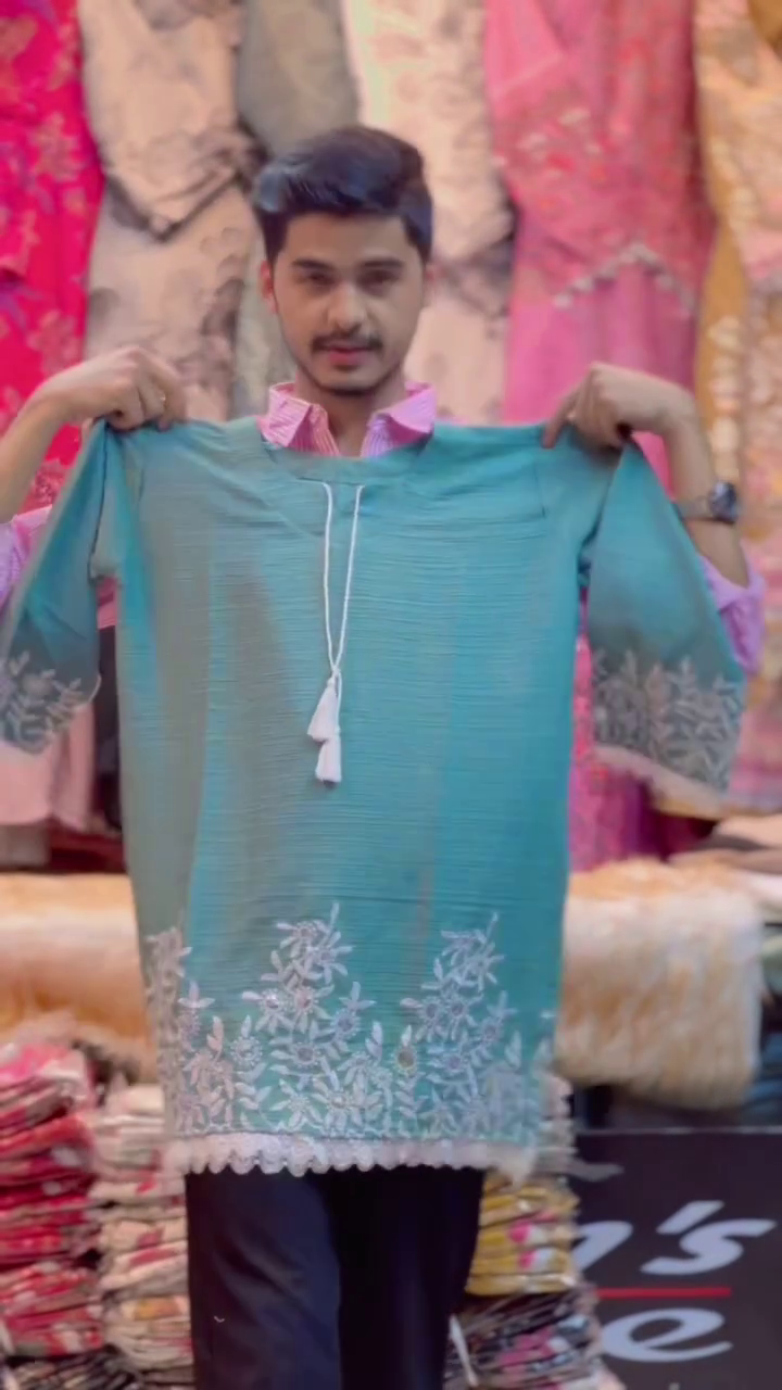 Elegant Teal Blue Kurti with White Floral Embroidery and Stylish Tassel Detailing for a Festive Ethnic Look