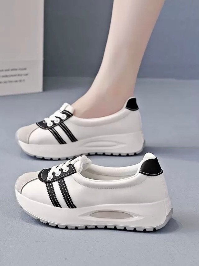 Stylish White Sneakers with Black Striped Design